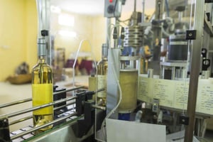 White-Wine-Bottles-Labeled-After-Drying-in-a-Winery